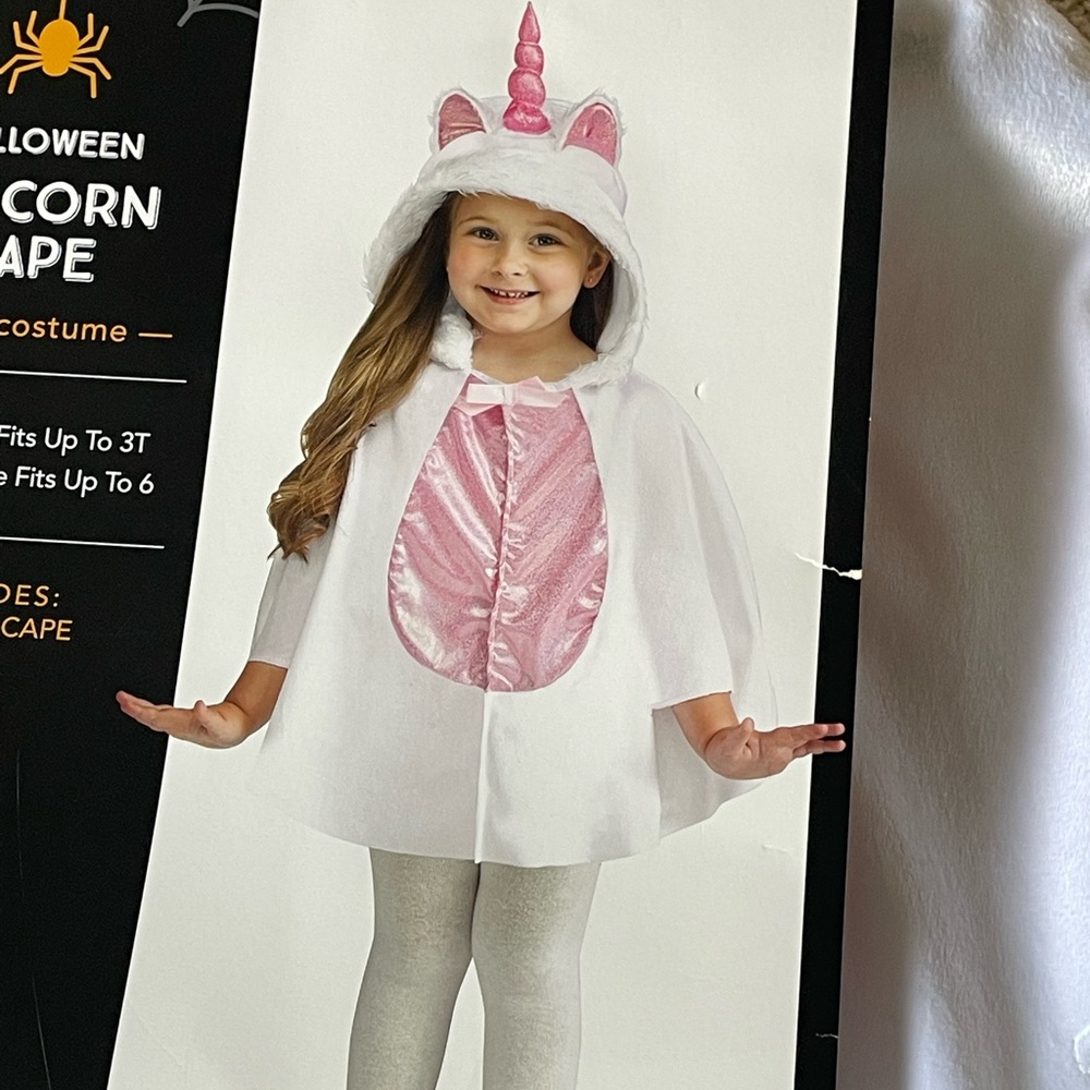 Unicorn costume. One size fits all. New with tags. Deluxe costume